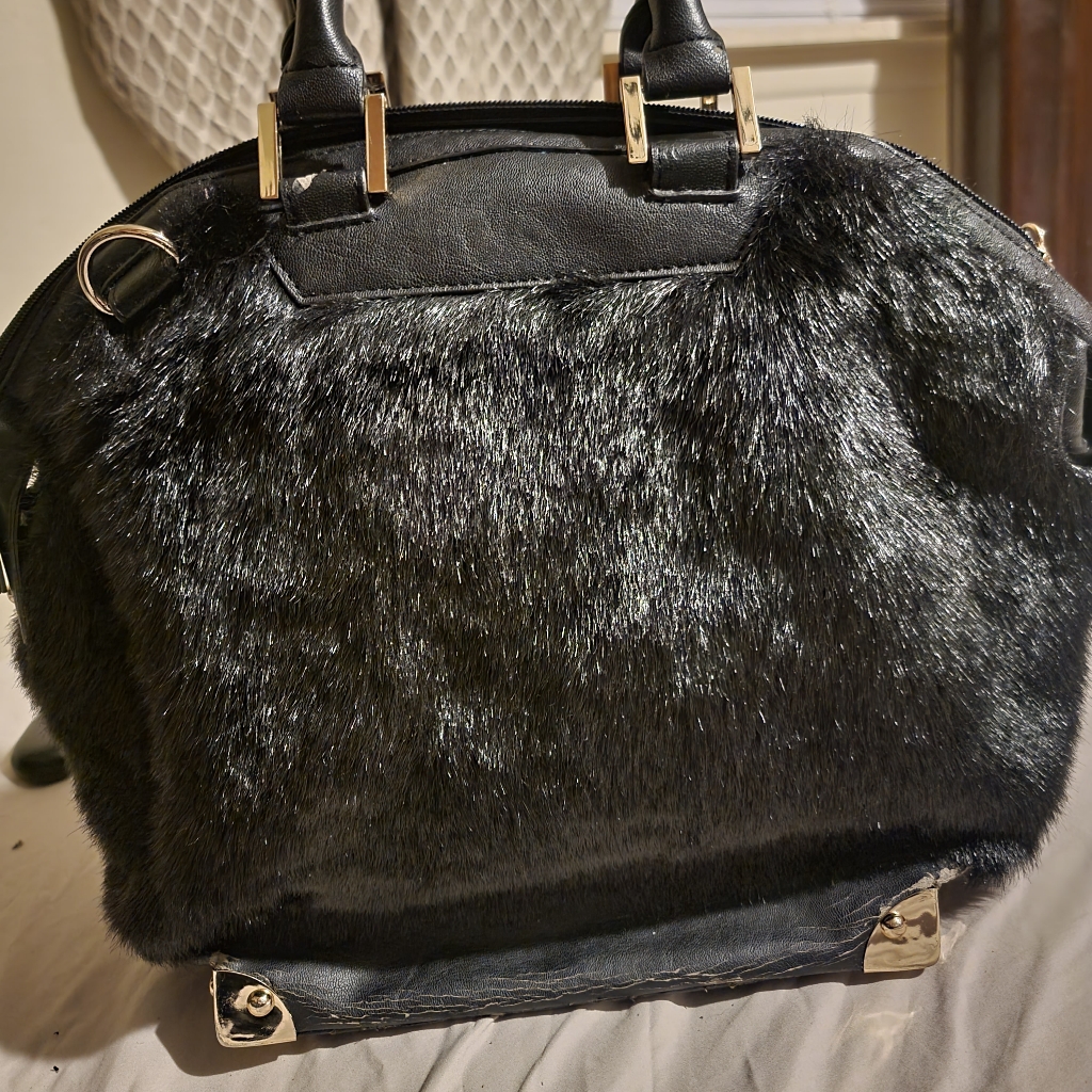 Donna Sawyers Fur Purse